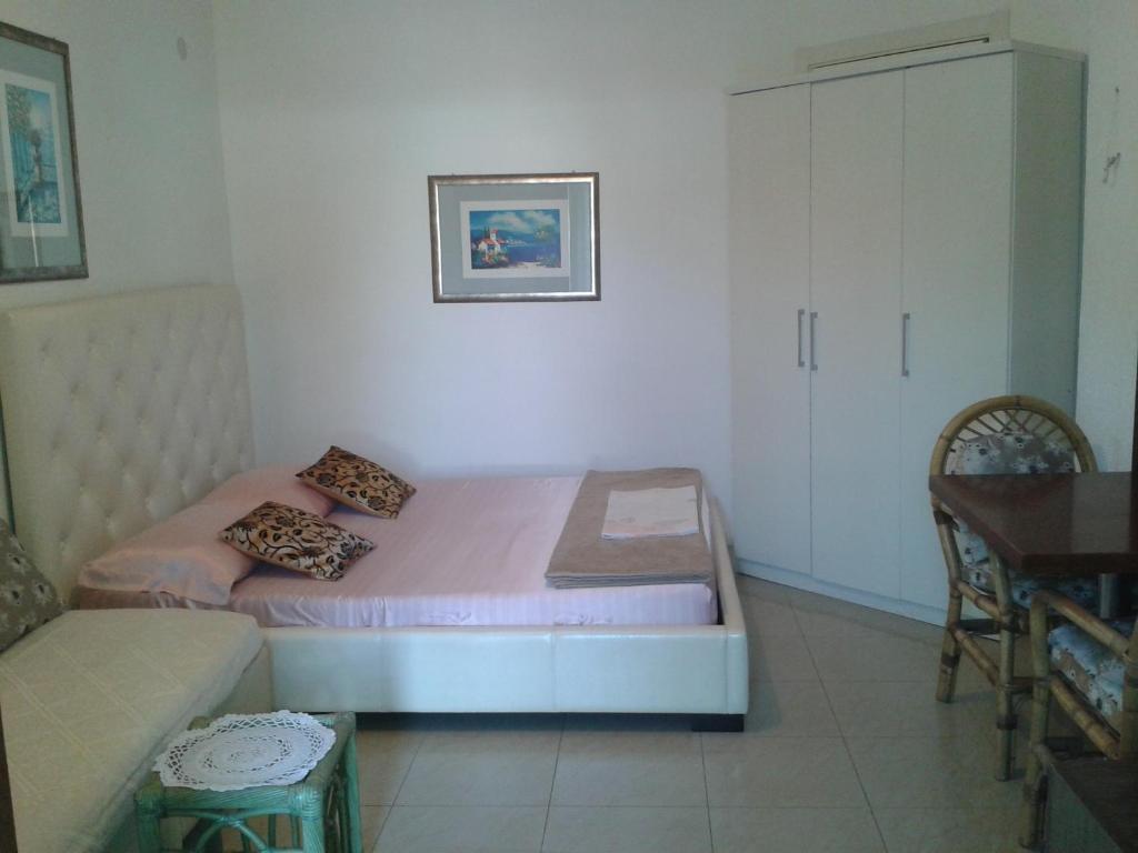 Collins Apartments Pula Chambre photo